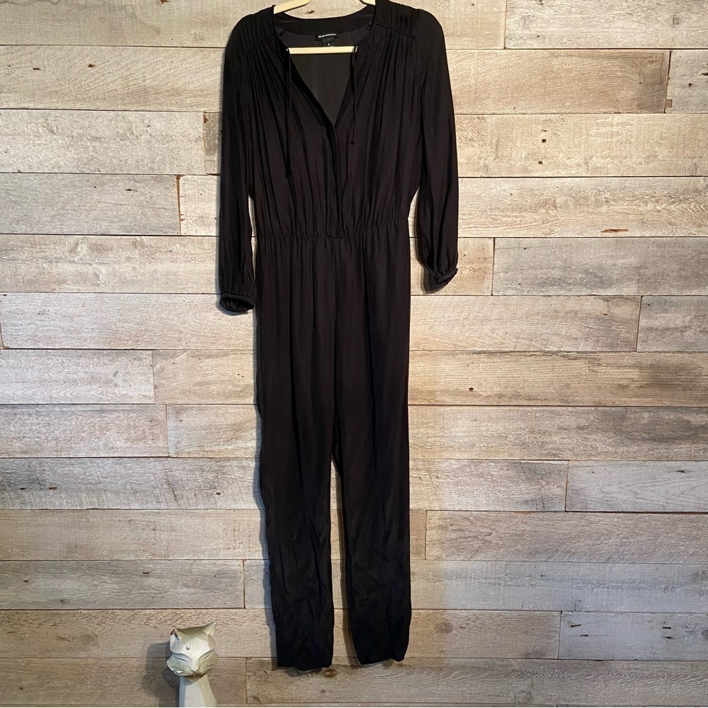 Club Monaco 100% silk black romper in size 0